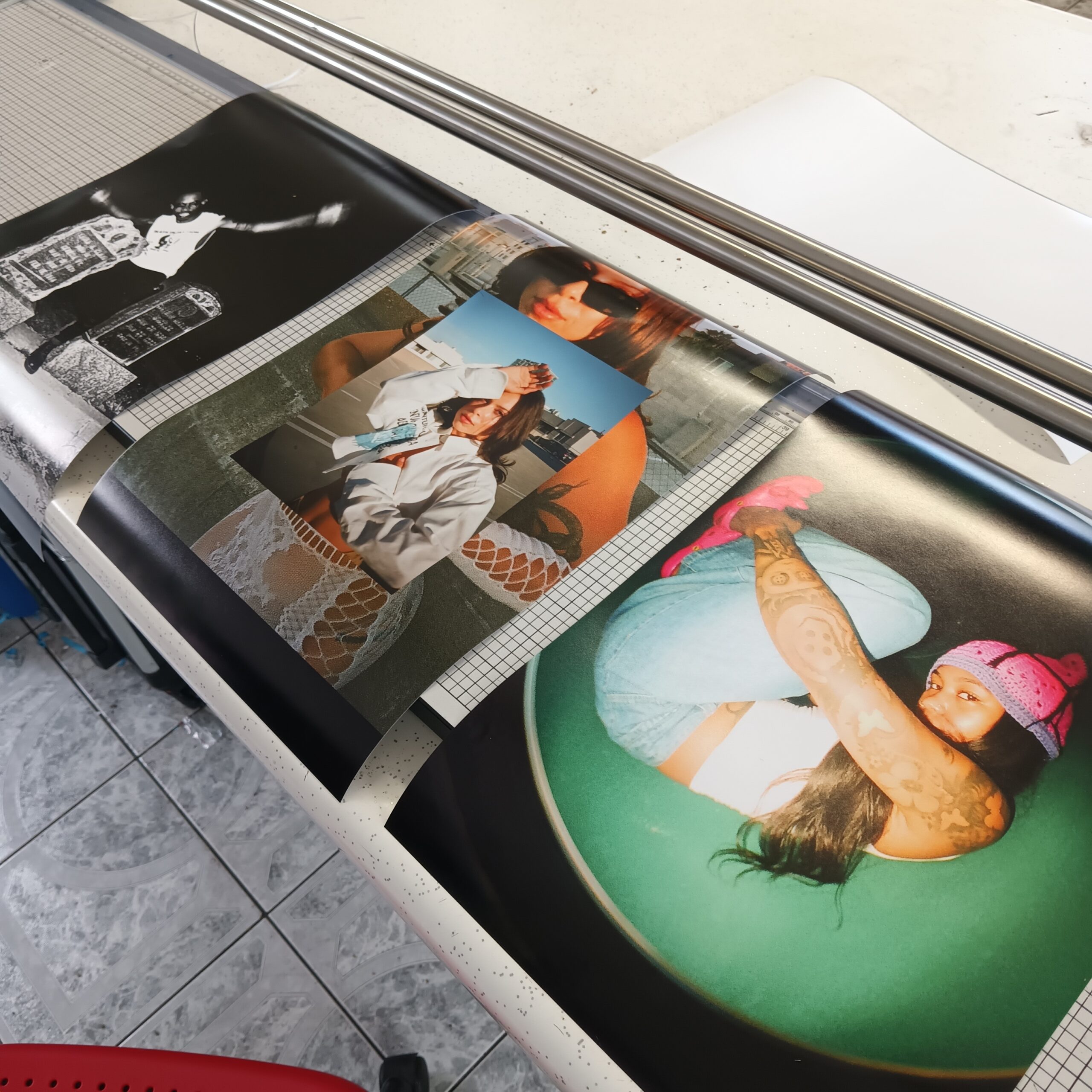 A printing press producing vibrant magazine covers featuring diverse people.