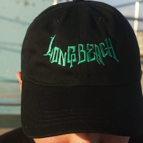 Black cap with neon green 'Long Beach' embroidery.