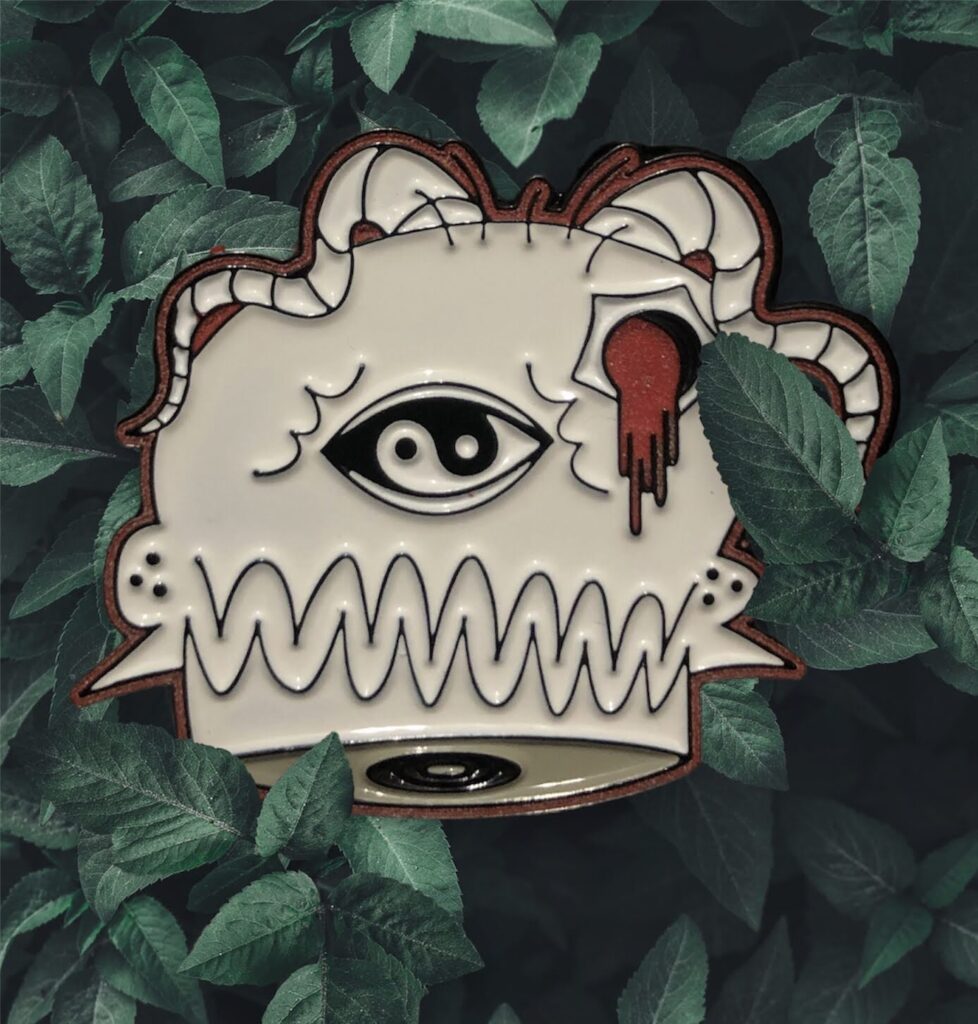 Surreal artwork of an eye and brain with a dripping red element surrounded by green leaves.