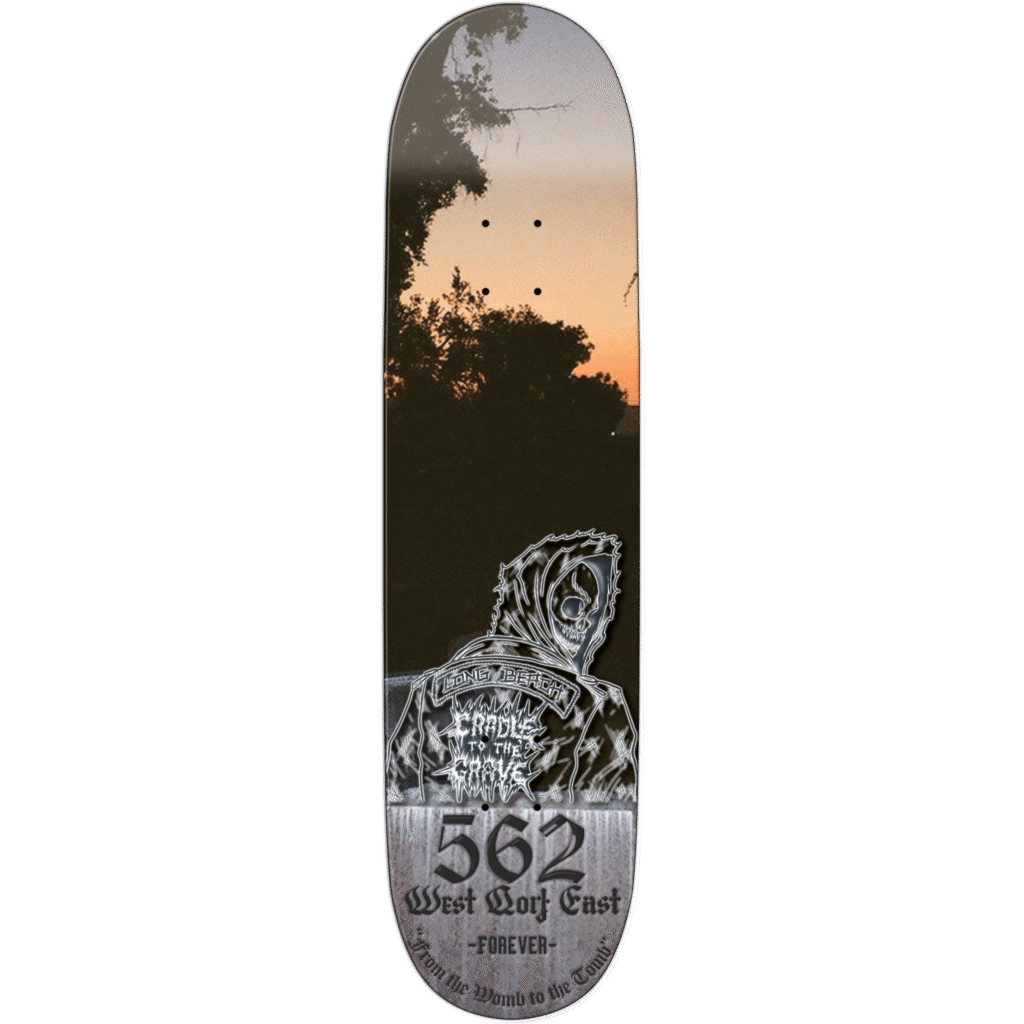 A skateboard deck with a tiger illustration at sunset.