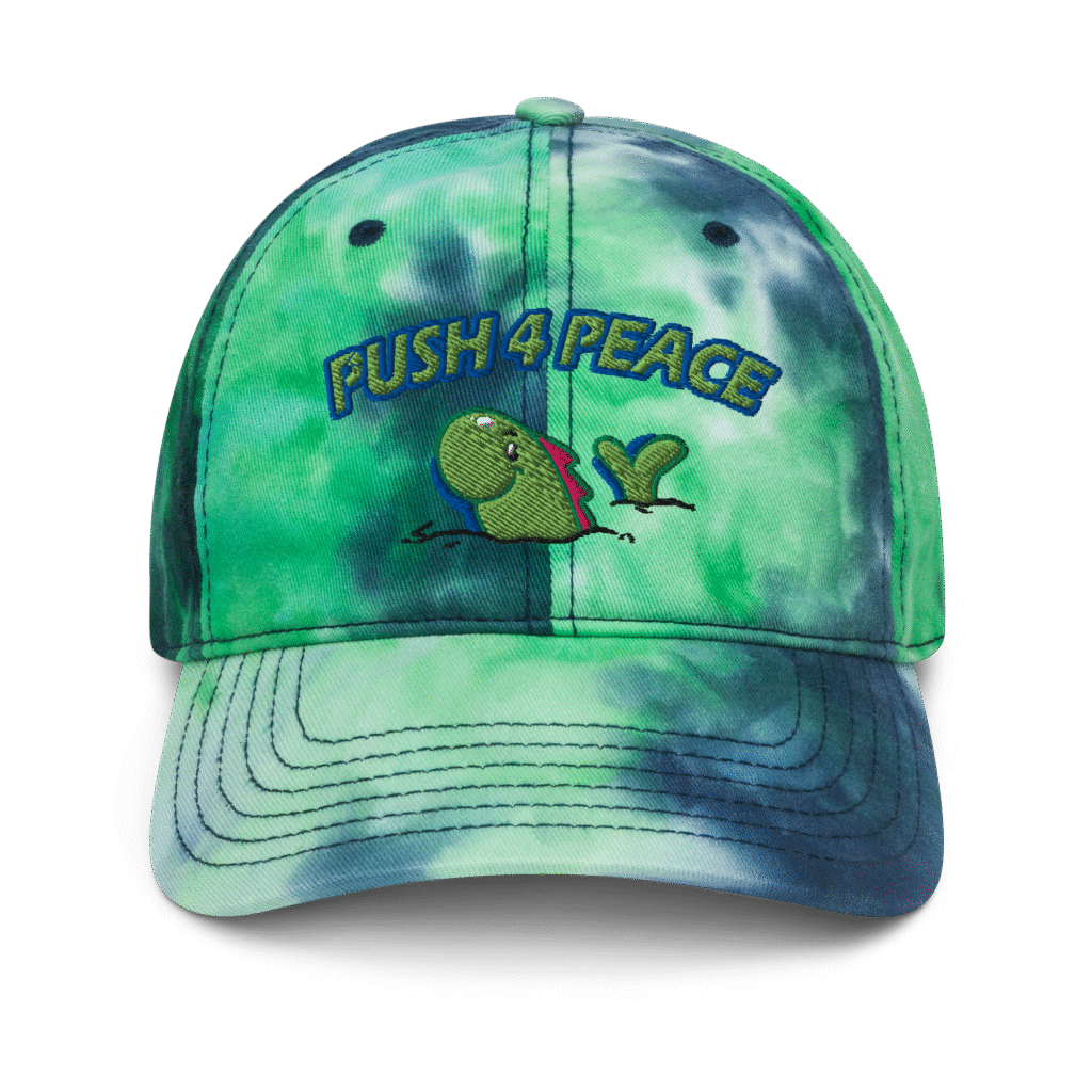 Green tie-dye cap with a peace message and turtle graphic.