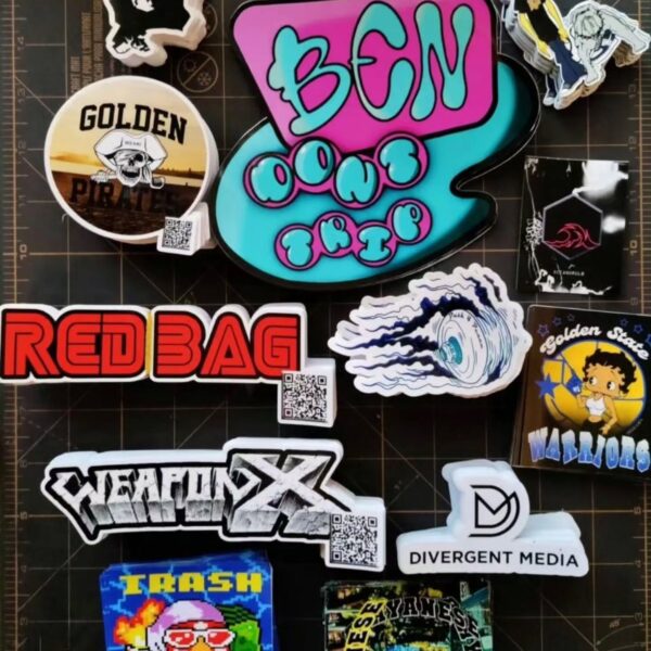 A collection of colorful patches with various designs and texts.